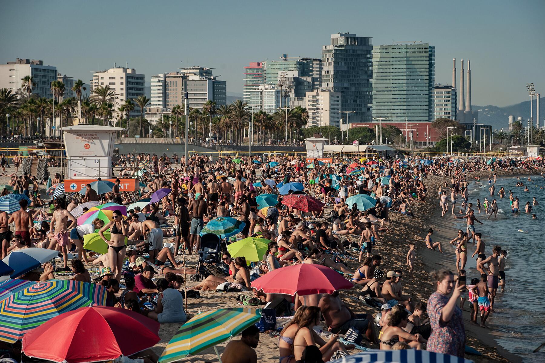 4_July 31, 2024, Barcelona, Spain People crowds at Bogatell beach_Alamy Stock_2XNGPDP